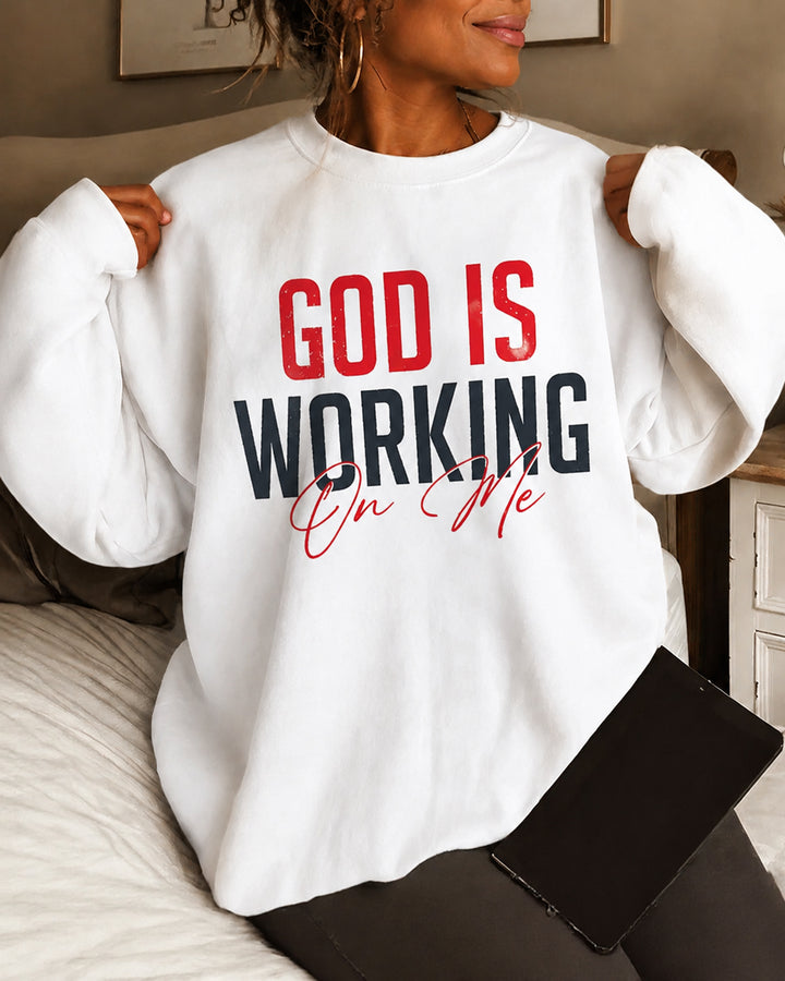Women's God Is Working On Me Round Neck Sweatshirt
